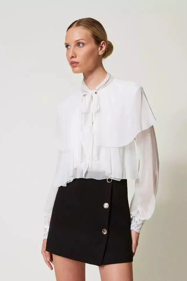 Jupe mini Twinset avec boutons en bijou