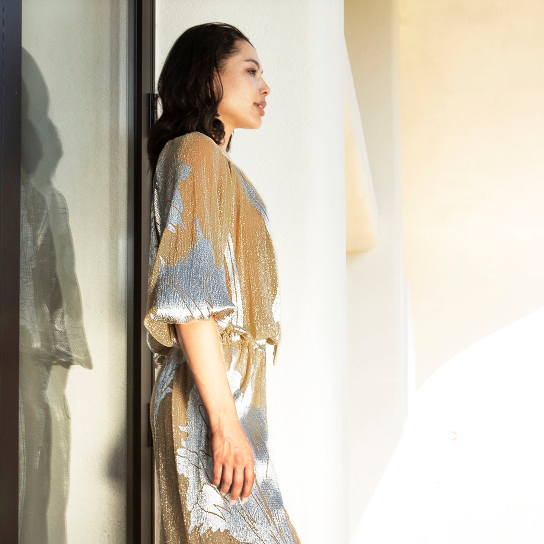 Aggél - Blouse en tissu plissé métallique avec détails tricotés