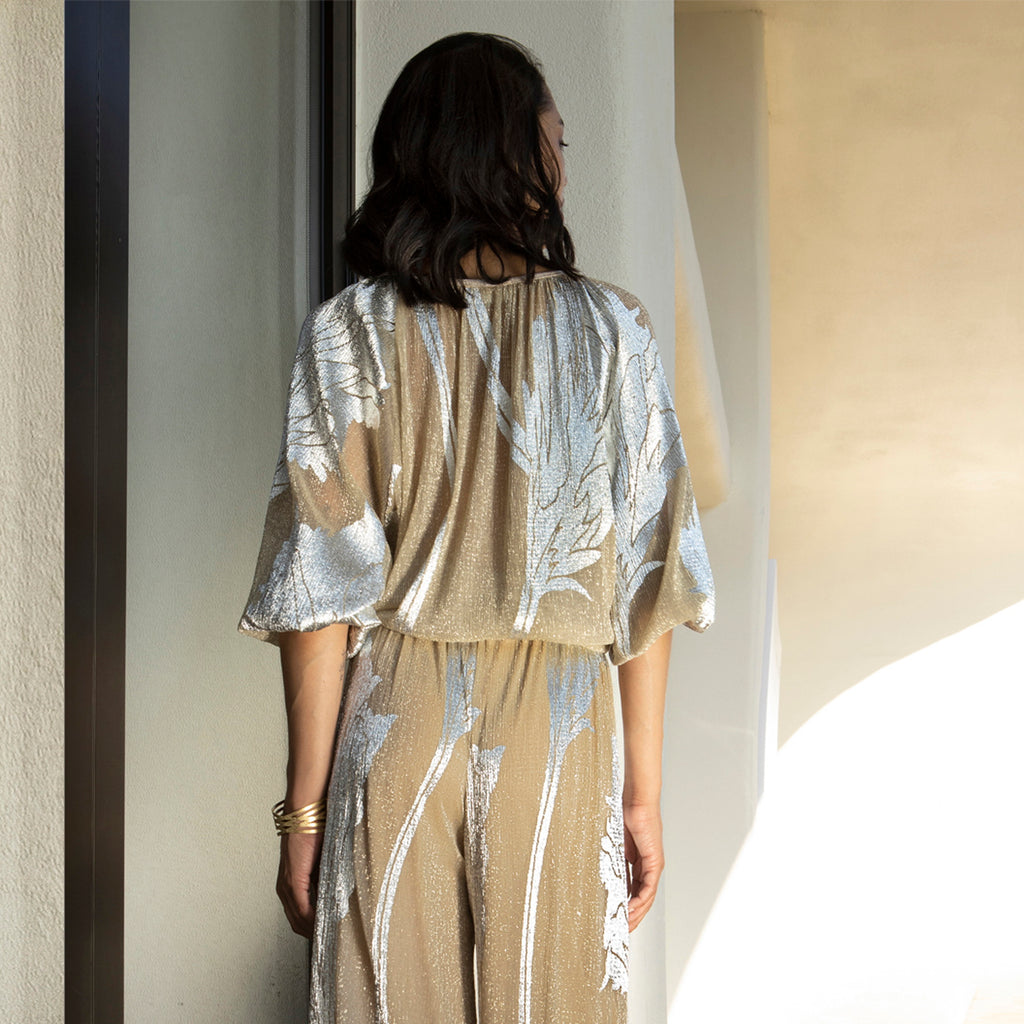 Aggél - Blouse en tissu plissé métallique avec détails tricotés